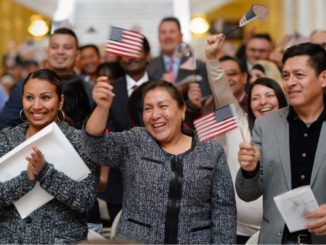 The people are holding the flag of America