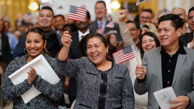 The people are holding the flag of America