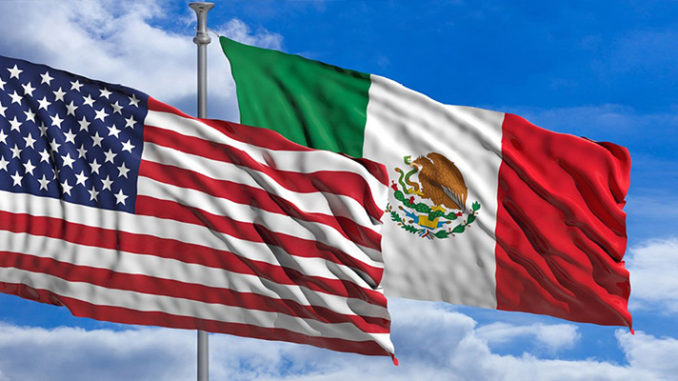 USA and Mexican Flag Flying in the same direction