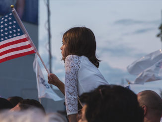 A Girl Holding National Flag and The New Swing Voters