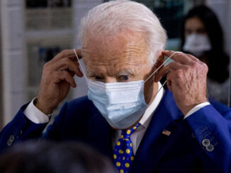 Picture of Biden wearing mask keeping the healthcare guidelines