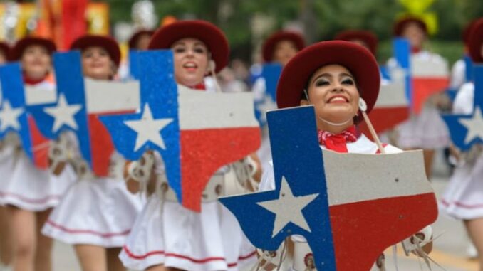 A day parade in the state fair of Texas