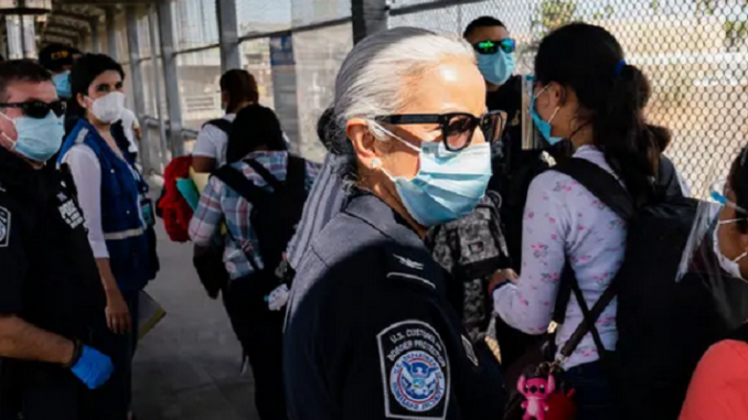 A Lady Officer Following Health Rules